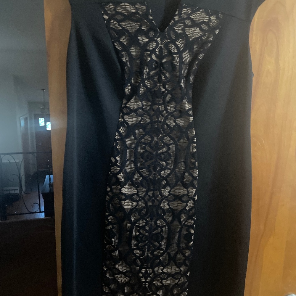 Black sleeveless dress with lace